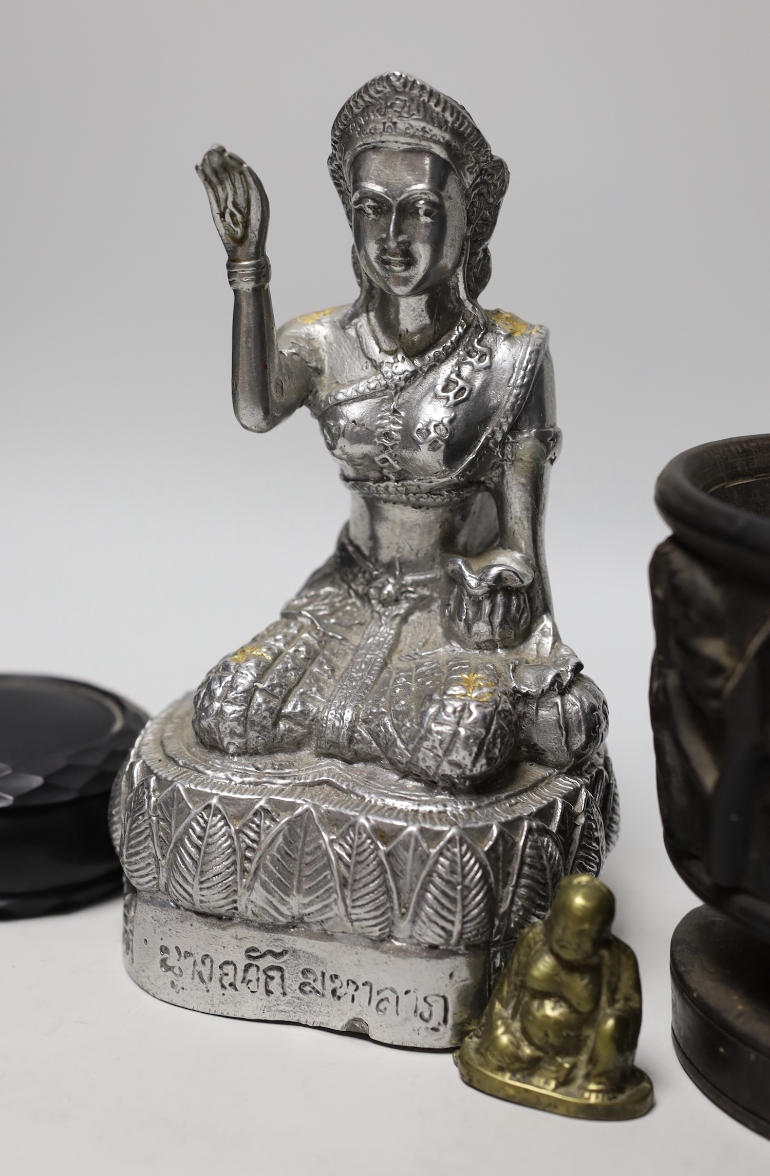 A Nepalese metal alloy figure of a Bodhisattva, 22cm and five other items